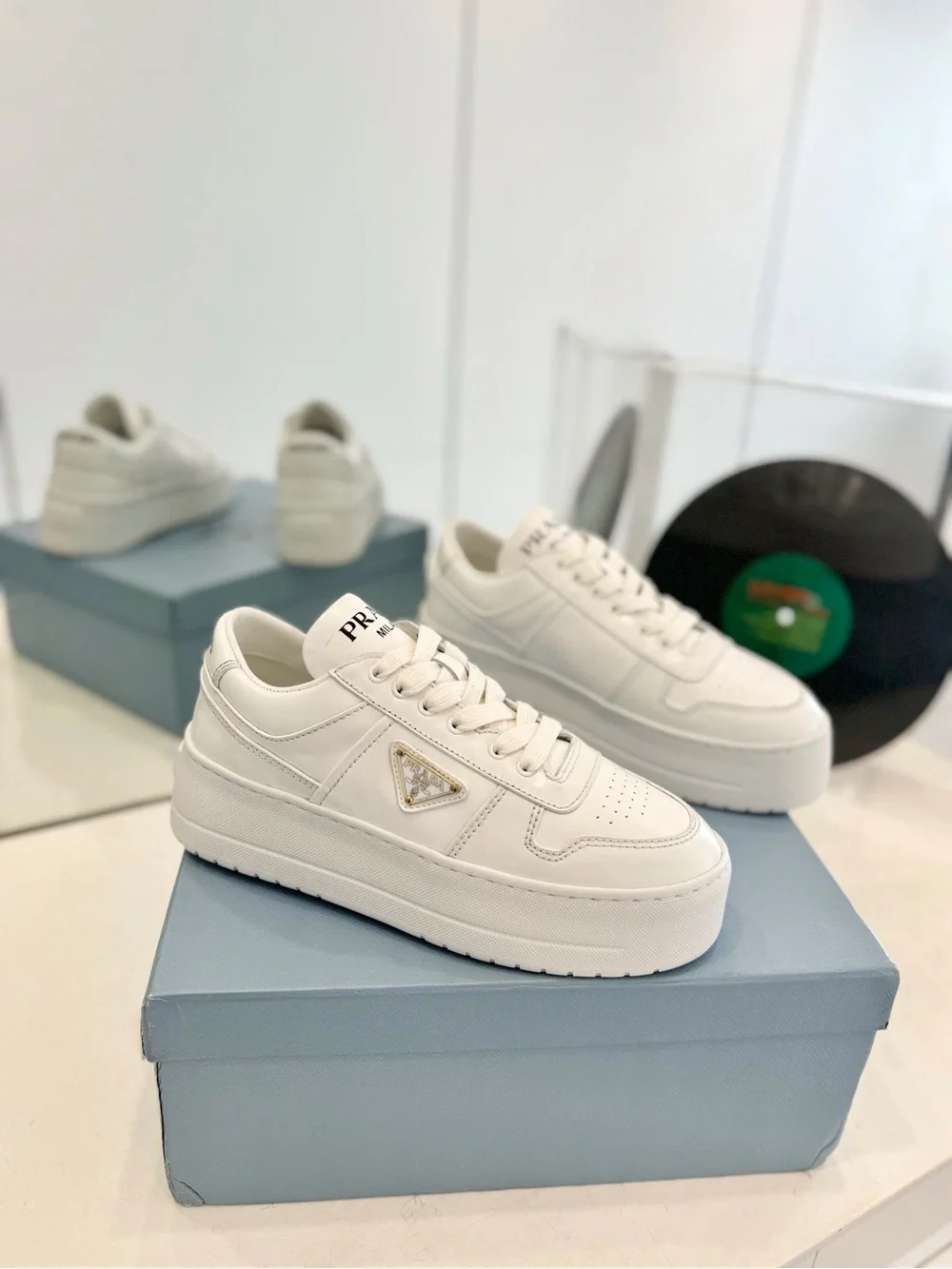 White Leather Platform Lace-Up Sneakers with Gold Triangle Accent